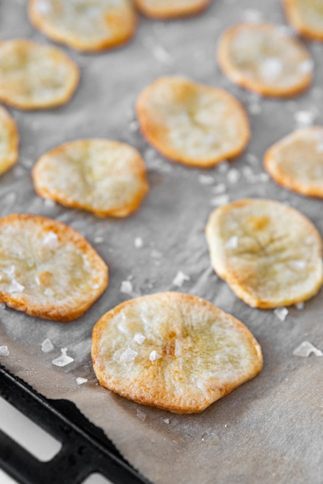 Photo of some baked chips on a baking dish